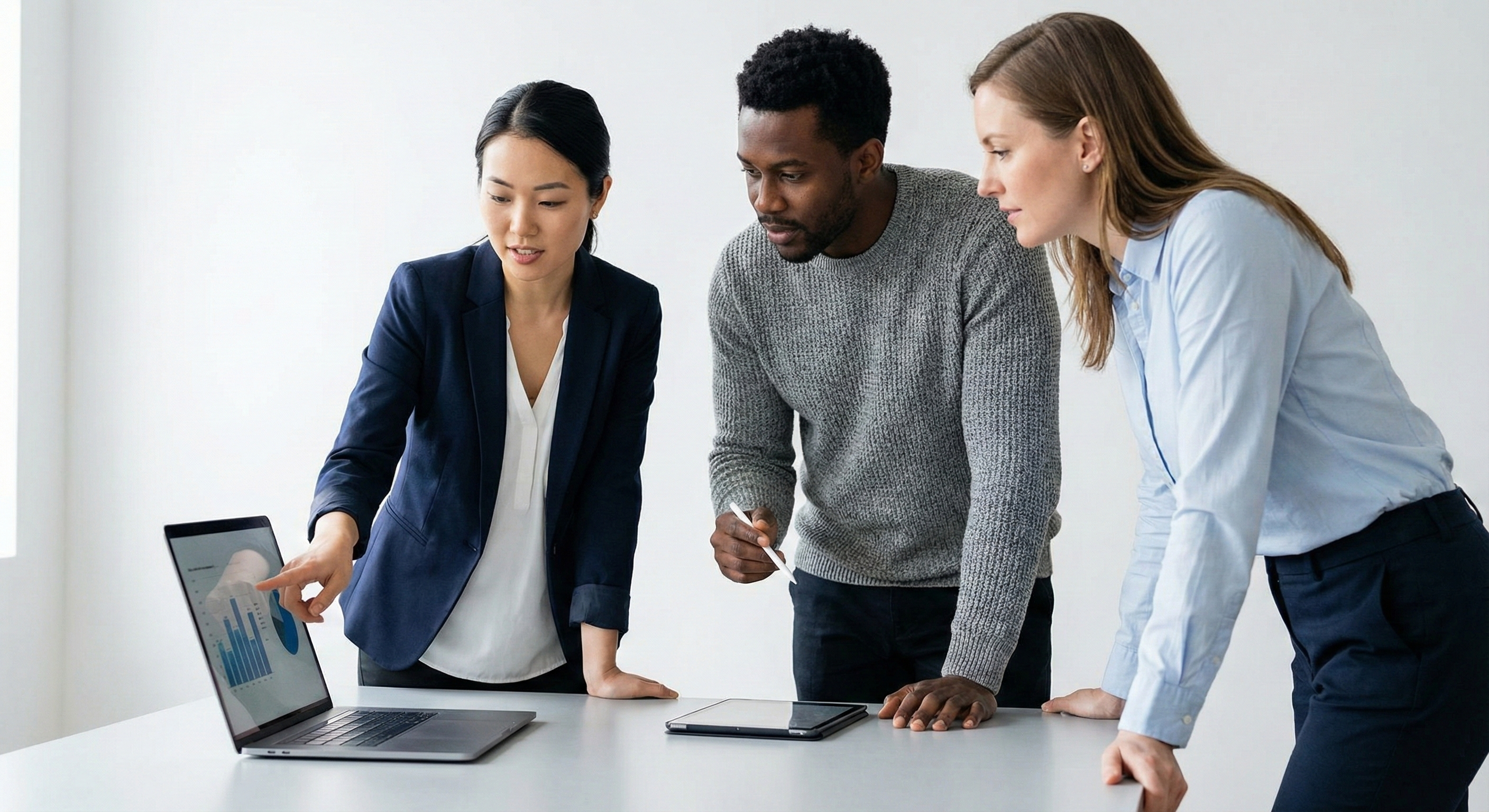 Benefits advisors reviewing analytics together